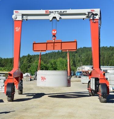 Shuttlelift SB Series overhead rubber-tired gantry cranes used in precast concrete industry