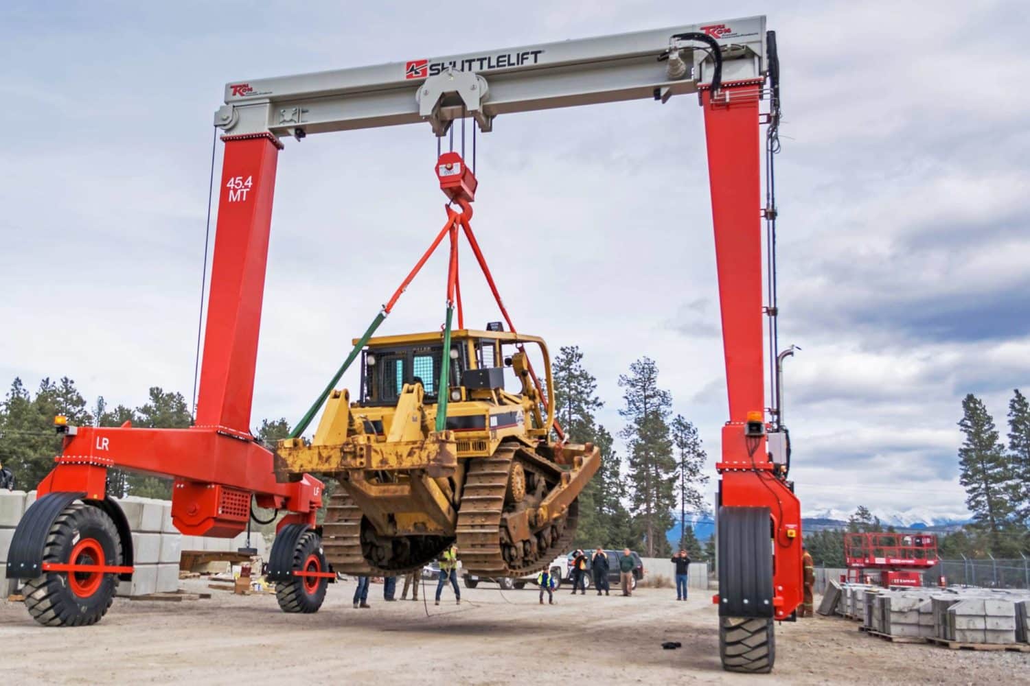 Crane Lifting Bulldozer Shuttlelift