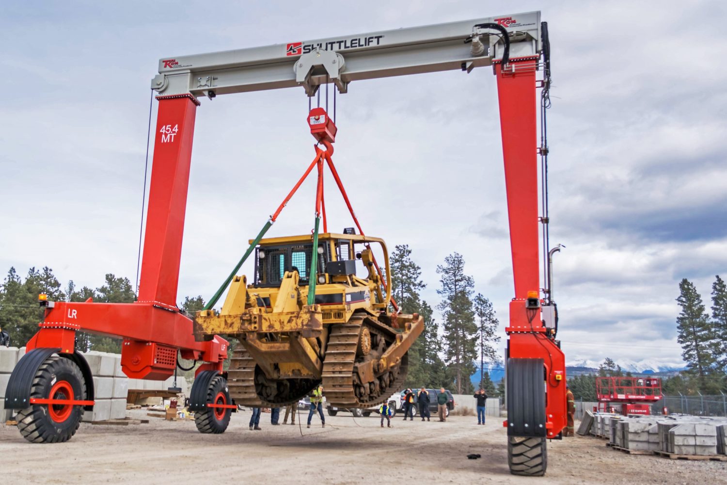 Crane Picking Up Construction Equipment